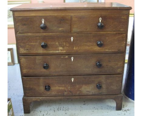 19th Century oak straight front chest of two short and three long drawers with knob handles, ivory escutcheons, on bracket fe