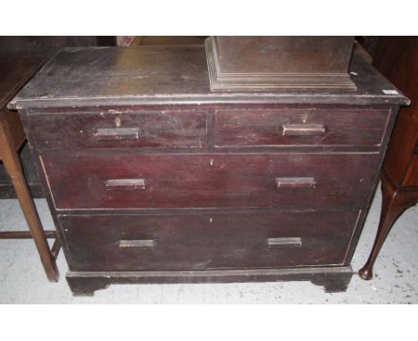 Early 20th Century stained pine straight front chest of two short and two long drawers on bracket feet.