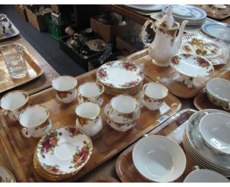 Two trays of Royal Albert bone china 'Old Country Roses' teaware items to include: teacups and saucers; side plates; teapot; 