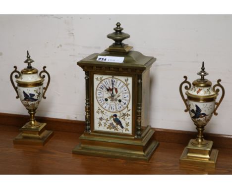 A Victorian and enamel clock garniture