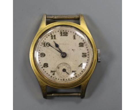 A gentleman's mid size gilt metal and steel Rolco manual wind wrist watch, no strap.