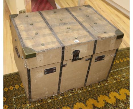 Bick and Son, Cheltenham. A late 19th century canvas covered tin trunk