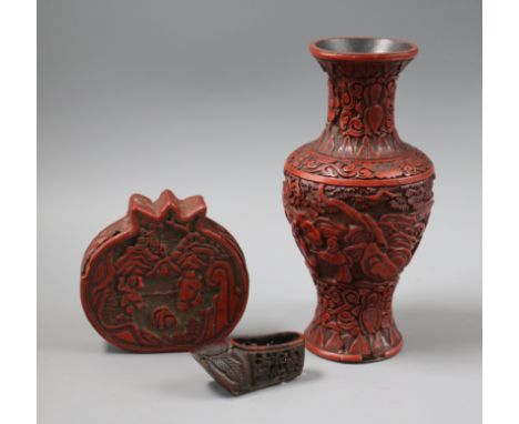 A Chinese cinnabar lacquer vase, a similar cover and a model of a shoe Tallest 19cm