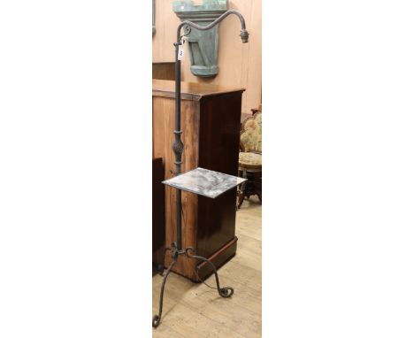 A French wrought iron standard lamp W.55cm