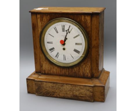 A French oak mantel timepiece height 40cm