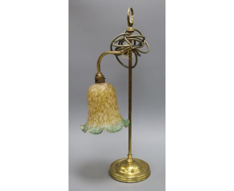 A brass reading lamp