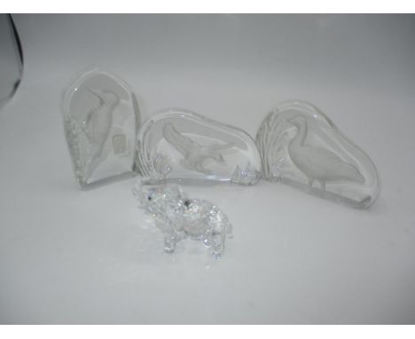 Three Wedgwood Glass Intaglio Moulded Sculptures and a Swarovski Elephant
