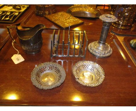Silver to include a Toast Rack, Cream Jug, Pair of Bonbon Dishes and a Candlestick, 312g excluding candlestick