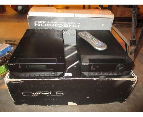 Cyrus Amplifier and CD Player, Boxed, with Papers, Remotes etc