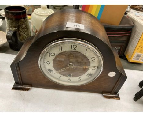 A VINTAGE OAK CASED BENTIMA WESTMINSTER CHIMING MANTLE CLOCK WITH PENDULUM AND KEY 