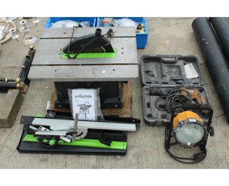AN ASSORTMENT OF TOOLS TO INCLUDE AN EVOLUTION TABLE SAW, A JCB DRILL AND A WORK LIGHT ETC 
