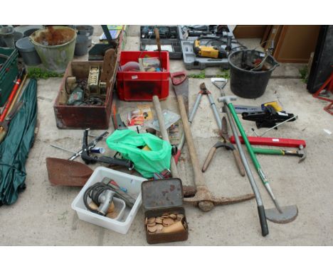 AN ASSORTMENT OF TOOLS TO INCLUDE A PICK AXE, A BOSCH ELECTRIC DRILL AND GARDENT OOLS ETC 