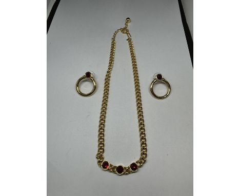 A MONET NECKLACE WITH RED STONES AND A PAIR OF MATCHING EARRINGS 