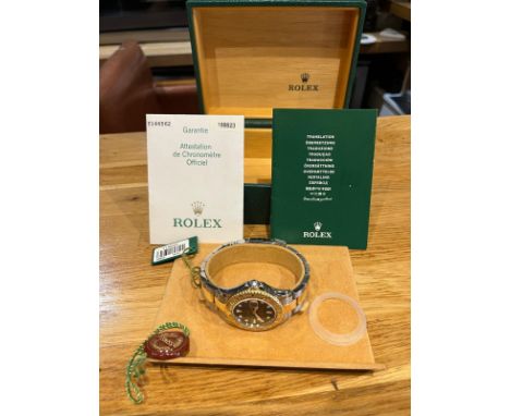 A ROLEX YACHT MASTER WRISTWATCH, 18 KARAT GOLD AND STAINLESS STEEL. MODEL NUMBER 168623, YEAR 2002, 35 MM DIAMETER. COMPLETE 