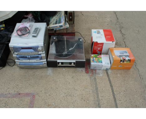 AN ASSORTMENT OF ITEMS TO INCLUDE A STEREO SYSTEM, A RECORD PLAYER AND CAMERA ITEMS ETC 