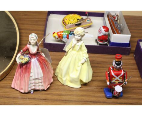 A ROYAL DOULTON FIGURINE "JANET" HN1537 TOGETHER WITH A ROYAL WORCESTER FIGURINE "GRANDMOTHER'S DRESS" NO. 3081 