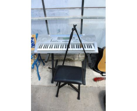 A CASIO ELECTRIC KEYBOARD WITH STAND, STOOL AND MIC STAND ETC 