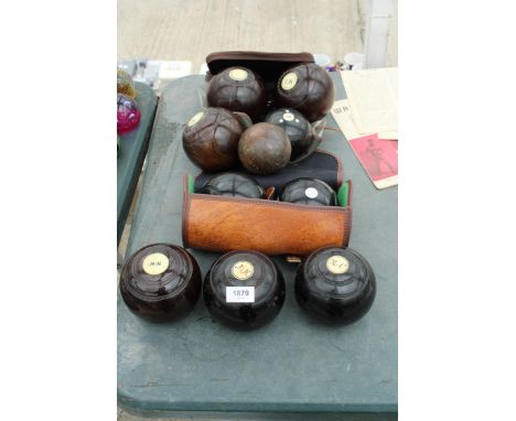 AN ASSORTMENT OF VARIOUS VINTAGE CROWN GREEN BOWLING WOODS AND JACKS WITH TWO CARRY CASES 