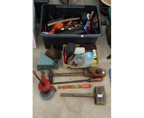 AN ASSORTMENT OF TOOLS TO INCLUDE A GRIND STONE, HAMMERS AND A DRILL ETC 