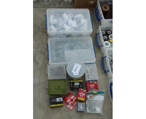 AN ASSORTMENT OF HARDWARE TO INCLUDE PIPE FITTINGS AND SCREWS ETC 