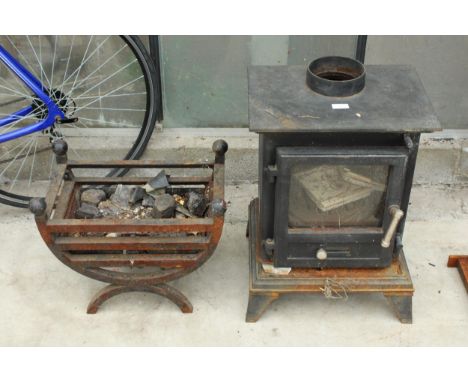 A VINTAGE CAST IRON LOG BURNER AND A CAST IRON FIRE GRATE 