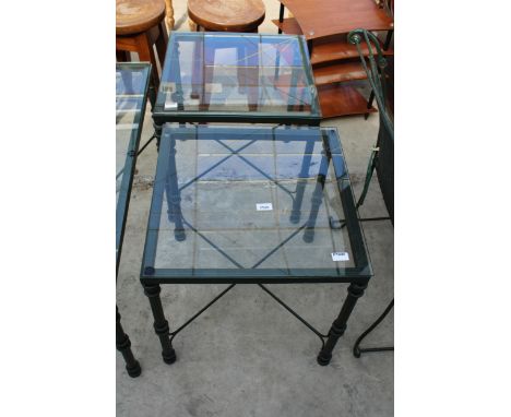 A PAIR OF GLASS TOP LAMP TABLES ON METALWARE FRAMES, EACH 20" SQUARE 