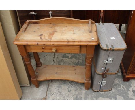 A PINE WASHSTAND 30" WIDE AND A COMPRESSED FIBRE TRAVELLING TRUNK 