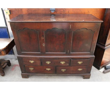 AN 18TH CENTURY OAK CUPBOARD WITH SINGLE DOOR TO UPPER PORTION AND FIVE DRAWERS TO BASE ON BRACKET FEET, 55" WIDE 