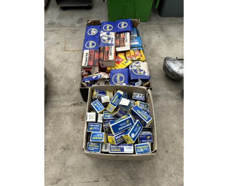 A LARGE QUANTITY OF CAR PARTS TO INCLUDE SPARK PLUGS AND BRAKE LIGHT SWITCHES ETC 