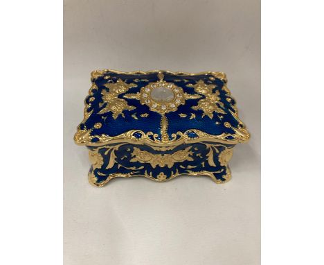A BLUE AND GOLD ENAMEL JEWELLERY BOX 
