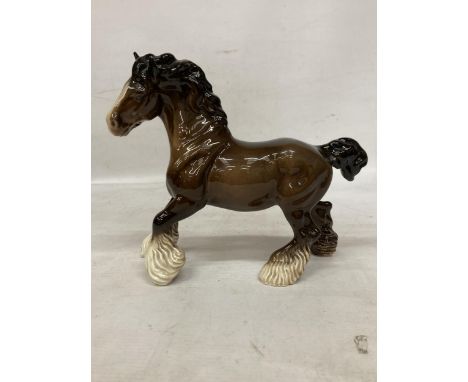 A BESWICK MODEL OF A CANTERING CLYDESDALE HORSE 