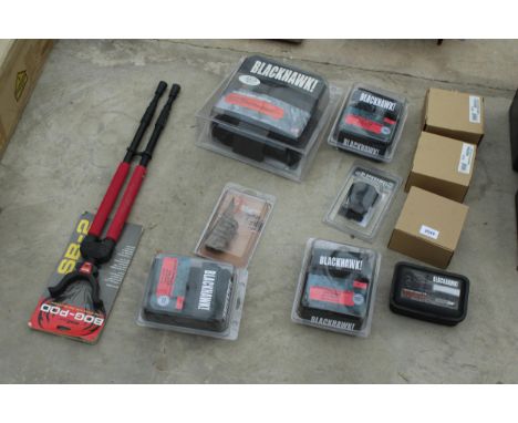 AN ASSORTMENT OF ITEMS TO INCLUDE BLACKHAWK SERPA CONCEALMENT HOLSTERS, A BOG-POD AND A BLACKHAWK NIGHT-OPS LIGHT ETC 