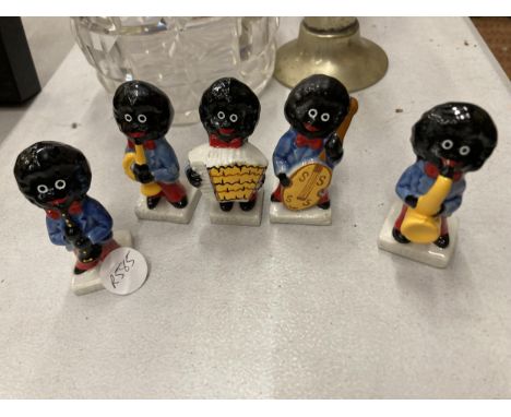 A COLLECTION OF FIVE ROBERTSONS BAND FIGURES Notice from the the-saleroom.com: These items are listed on the basis they are i