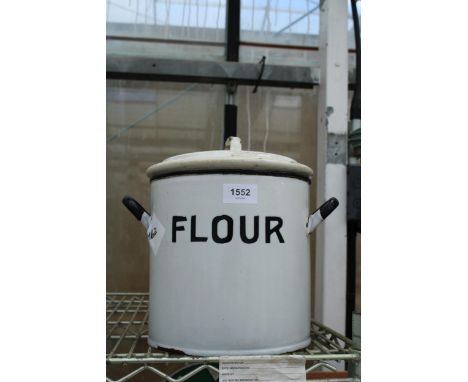 A BLACK AND WHITE ENAMEL FLOUR CADDY 