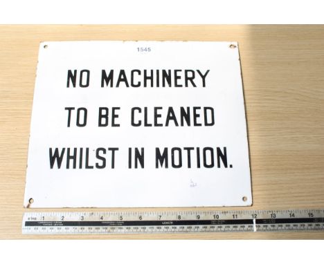 AN ENAMEL 'NO MACHINERY' SIGN 