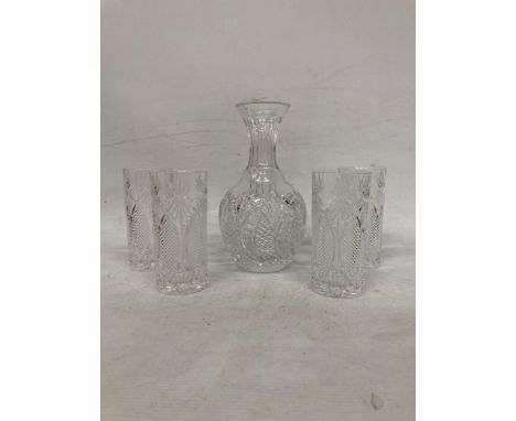 A WATERFORD CRYSTAL SEAHORSE CARAFE WITH FOUR TUMBLERS 