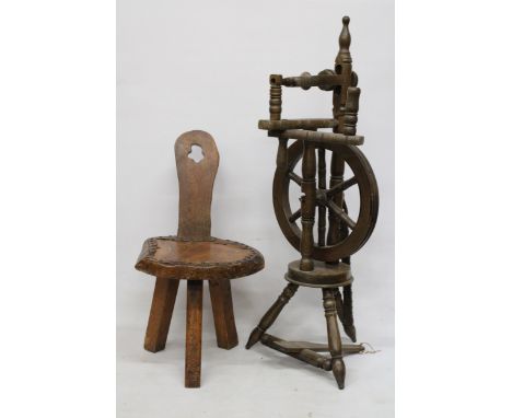 A VINTAGE WOODEN SPINNING WHEEL AND CHAIR 
