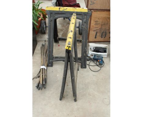 AN ASSORTMENT OF TOOLS TO INCLUDE TWO PLASTIC TRESTLE BASES, A DRILL AND DRAINING RODS 
