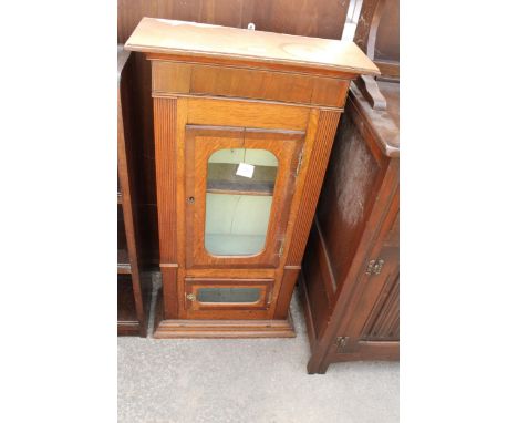 AN OAK AND CROSSBANDED CUPBOARD, ORIGINATING FROM A LONGCASE CLOCK 