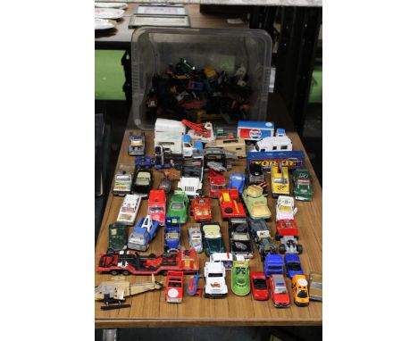 A LARGE QUANTITY OF TOY VEHICLES TO INCLUDE THOMAS THE TANK ENGINE, CAR TRANSPORTERS, VINTAGE CARS, HELICOPTERS ETC 
