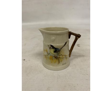 A VINTAGE ROYAL WORCESTER BARREL JUG WITH HANDPAINTED BLUE TIT, SIGNED H RUSSELL 