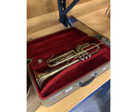 A VINTAGE CASED TRUMPET WITH CUSHIONED INTERIOR 