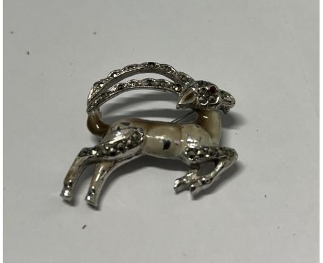 A VINTAGE ENAMEL AND MARCASITE GAZELLE BROOCH 