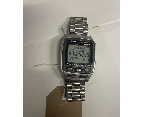 A CASIO MULTI LINGUAL DATA BANK LCD WRIST WATCH SEEN WORKING BUT NO WARRANTY 