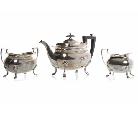 GEORGE V SILVER THREE PIECE TEA SERVICEmaker Walker & Hall, Sheffield 1923, with wavy rim and each of rounded oblong form, th