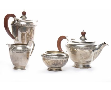 MODERN SILVER FOUR PIECE TEA SERVICEmaker Wakely & Wheeler, London 1973, each of tapering circular form, with banding engrave
