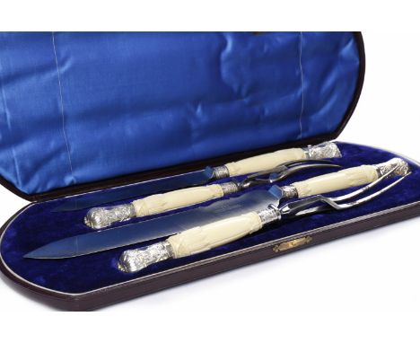 EDWARDIAN SILVER HANDLED CARVING SETmaker Harrison Brothers & Howson, Sheffield 1907, retailed by Sorley of Glasgow, comprisi