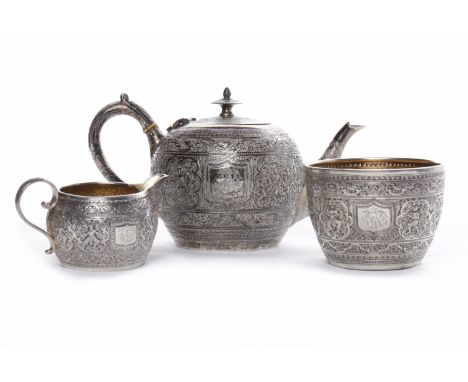 VICTORIAN THREE PIECE SILVER BATCHELOR'S TEA SERVICE maker 'JR', Glasgow 1884, each of circular form and elaborately chased w