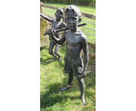 Bronze life-size figure of boy with sword - Height: 123cm Ankle and the sword have been historically repaired.