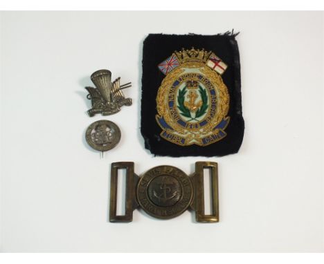 A Naval Belt buckle and "Royal Naval Engine Room Artificer 1868 - Tubal Cain" cloth badge together with a Canadian Parachute 